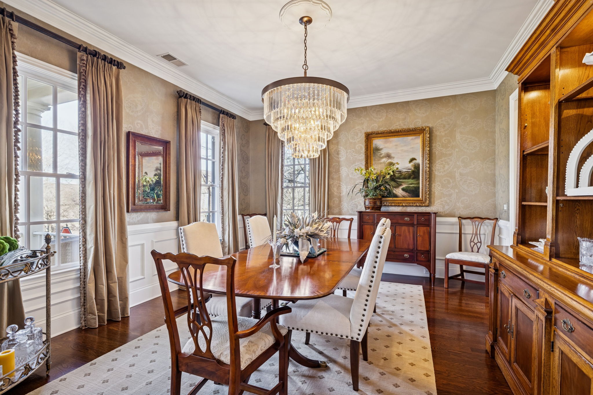600 Pearre Springs Way Franklin, TN 37064 - Photo 13 of 85 a dining room with furniture a chandelier and wooden floor
