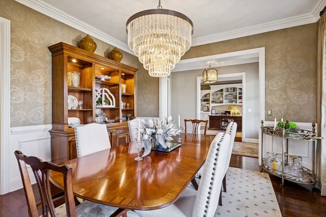a living room with furniture fireplace and flat screen tv