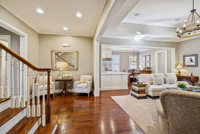 a kitchen with stainless steel appliances a sink a stove and refrigerator