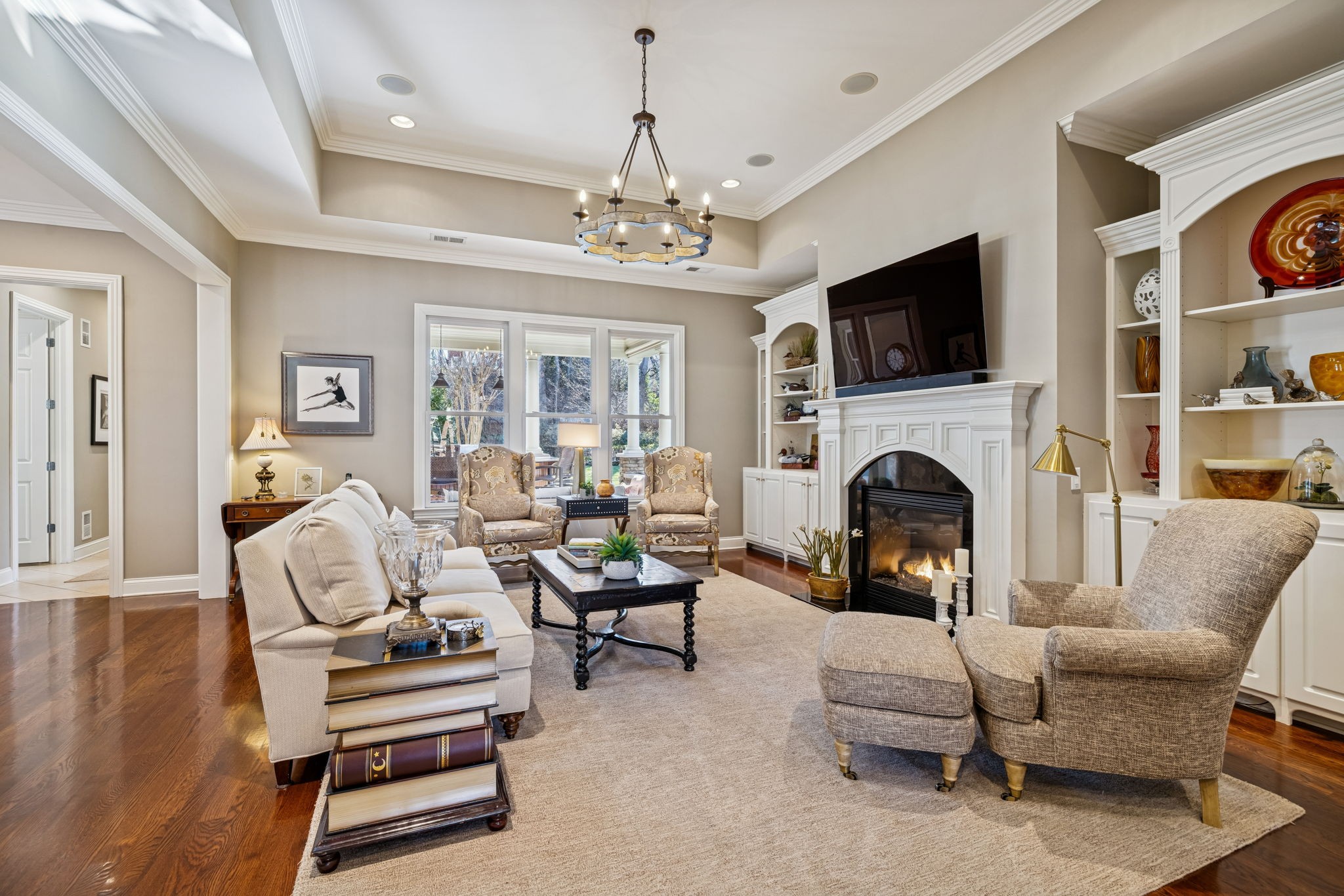 600 Pearre Springs Way Franklin, TN 37064 - Photo 21 of 85 a living room with furniture fireplace and flat screen tv