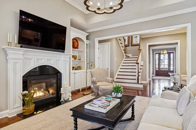 a kitchen with granite countertop a sink stainless steel appliances and cabinets