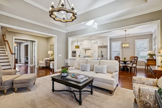 a kitchen with granite countertop a sink stainless steel appliances and cabinets