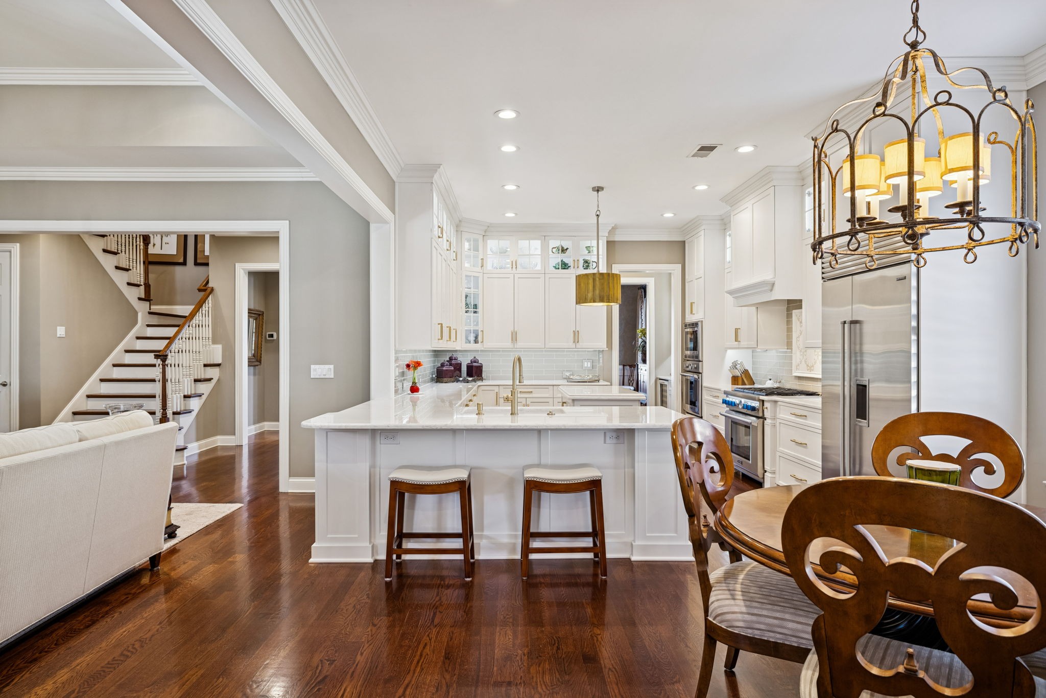 600 Pearre Springs Way Franklin, TN 37064 - Photo 30 of 85 a view of a dining room with furniture and wooden floor