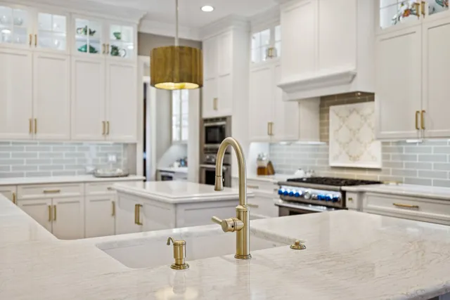 a bed room with a bed and a chandelier