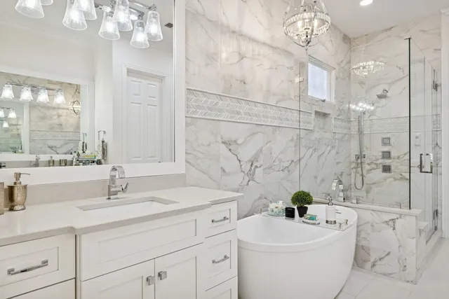 a view of a chair and table in the backyard