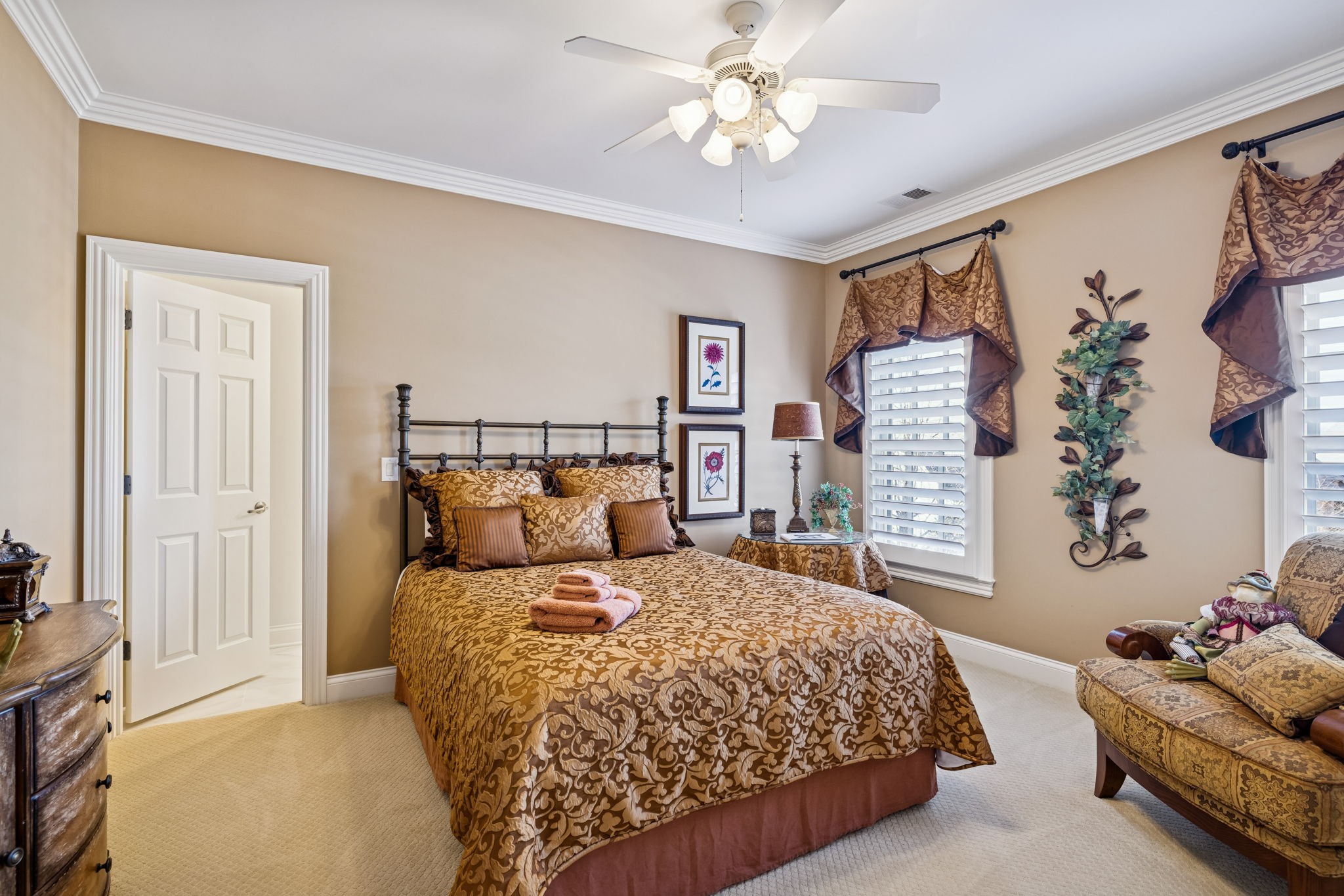 600 Pearre Springs Way Franklin, TN 37064 - Photo 56 of 85 a bedroom with a bed and a chandelier