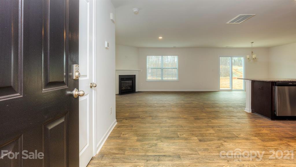 348 Gaines Road Clover, SC 29710 - Photo 17 of 48 a view of a room with wooden floor and staircase