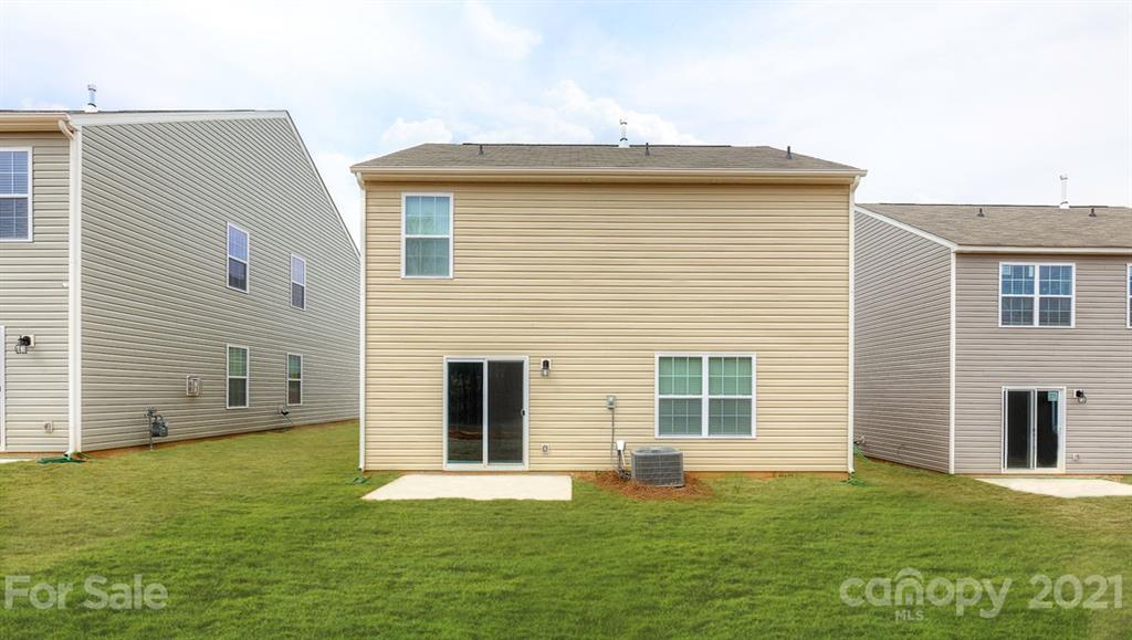 348 Gaines Road Clover, SC 29710 - Photo 3 of 48 a view of a backyard with a garden