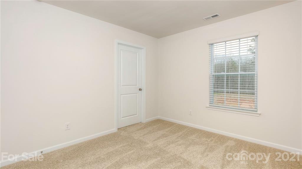 348 Gaines Road Clover, SC 29710 - Photo 37 of 48 an empty room with a window