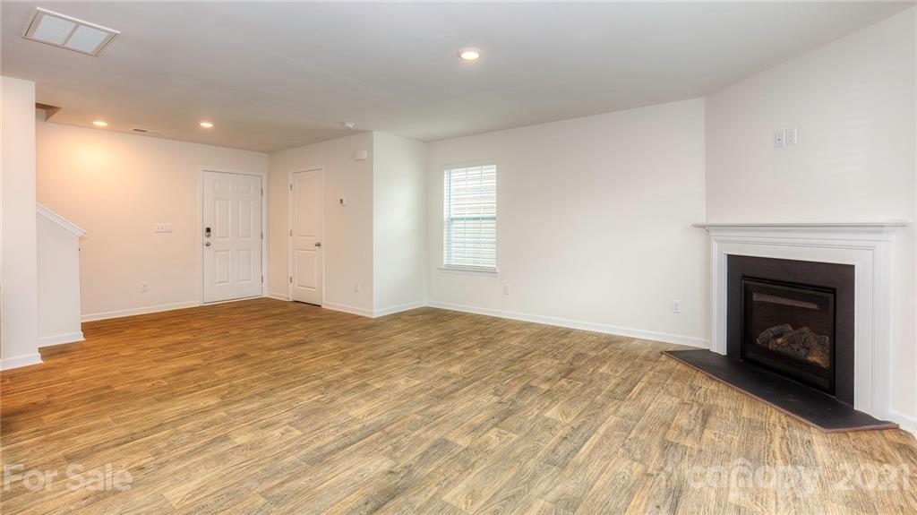 348 Gaines Road Clover, SC 29710 - Photo 43 of 48 a view of empty room with window and fireplace