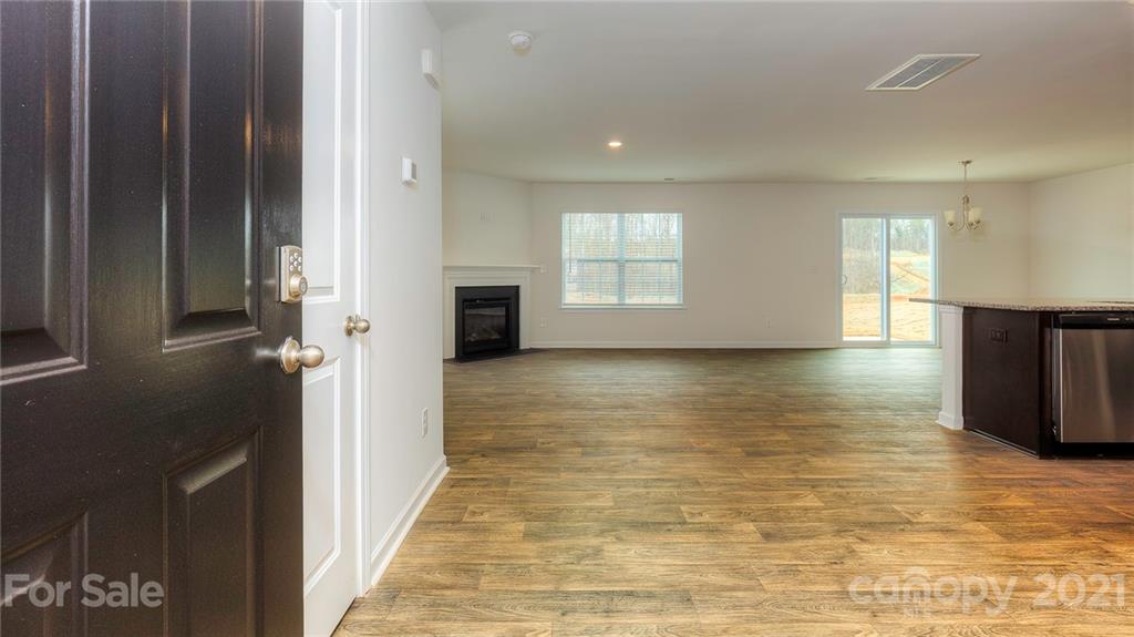 348 Gaines Road Clover, SC 29710 - Photo 45 of 48 a view of a room with wooden floor and staircase