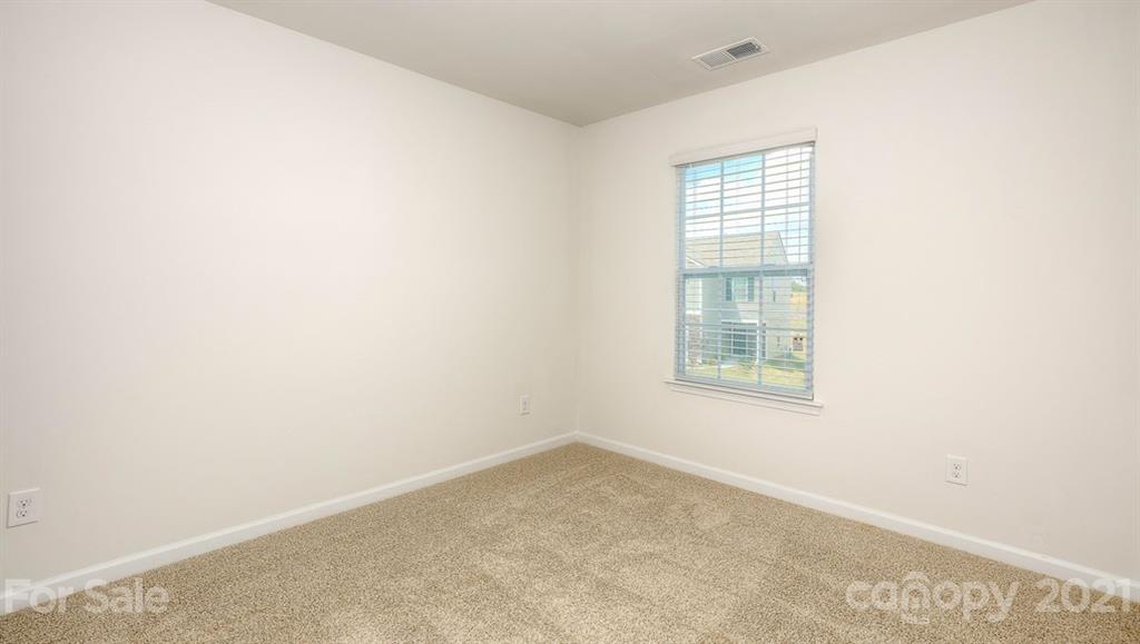 348 Gaines Road Clover, SC 29710 - Photo 7 of 48 an empty room with a window