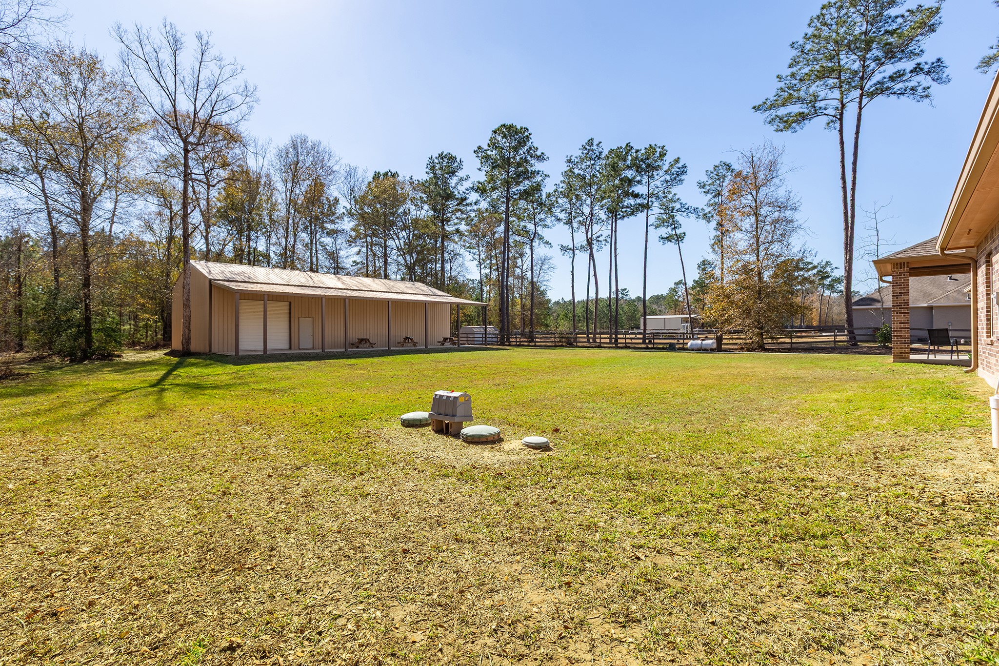 27688 Rio Blanco Drive Splendora, TX 77372 - Photo 45 of 50 a view of a swimming pool with an outdoor space and seating area