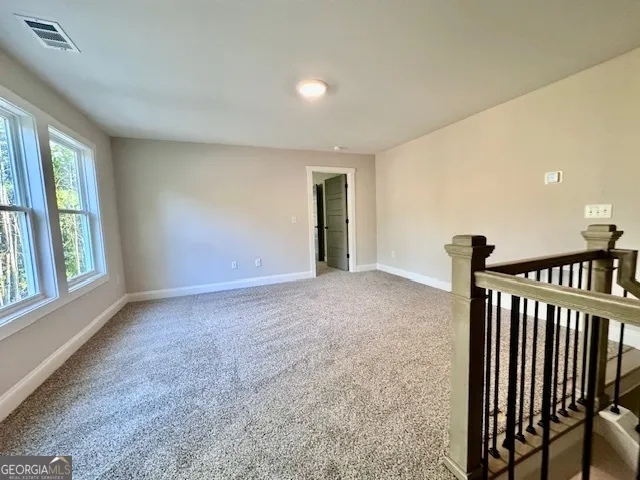 a view of hallway with livingroom