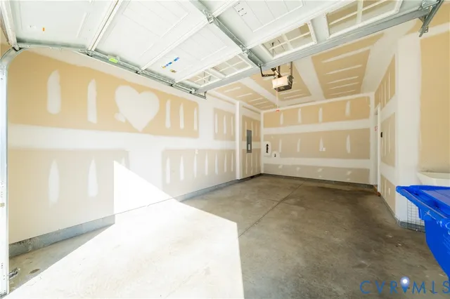 a large kitchen with kitchen island white cabinets and wooden floor