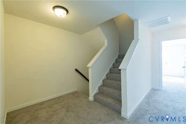 a view of a room with a wall