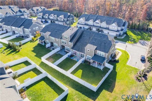 an aerial view of a house with swimming pool