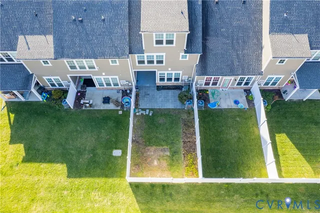 a view of a chairs and table in patio