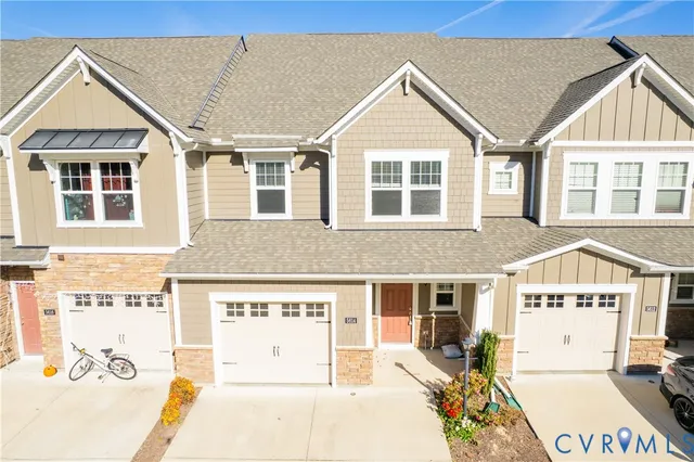 a view of a brick building with many windows