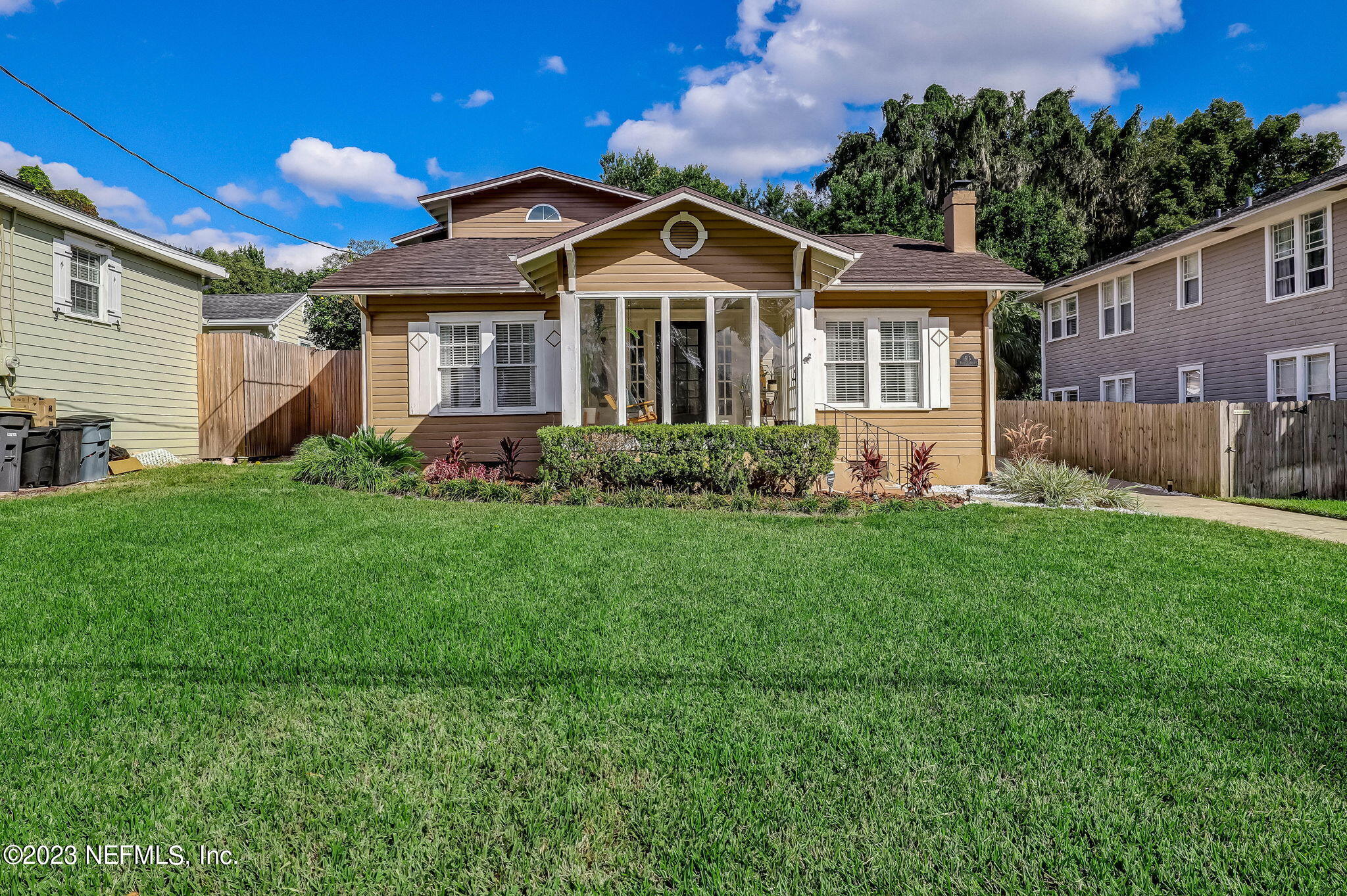 1515 Mayfair Road Jacksonville, FL 32207 - Photo 1 of 52 a front view of a house with garden
