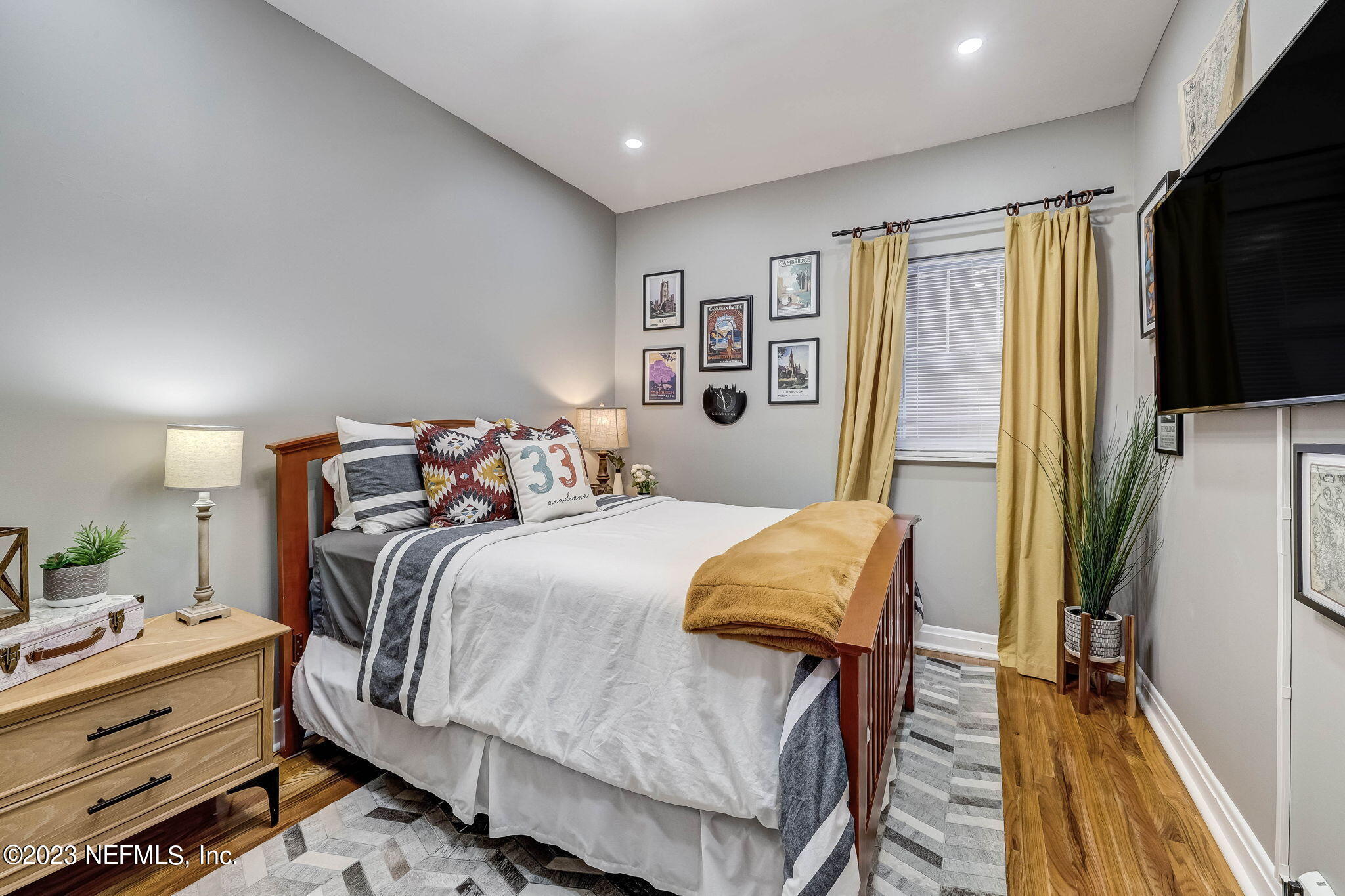 1515 Mayfair Road Jacksonville, FL 32207 - Photo 28 of 52 a bed room with a bed and a television