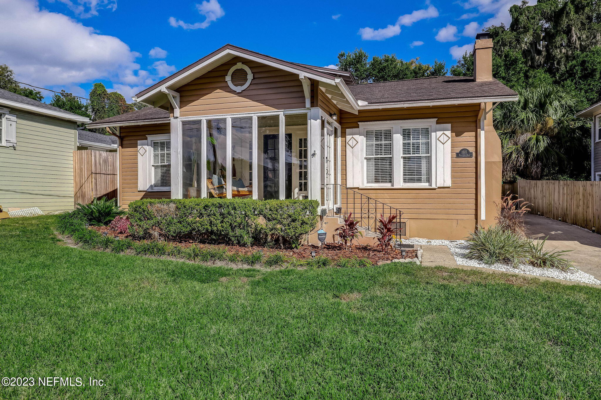 1515 Mayfair Road Jacksonville, FL 32207 - Photo 3 of 52 a front view of a house with a yard