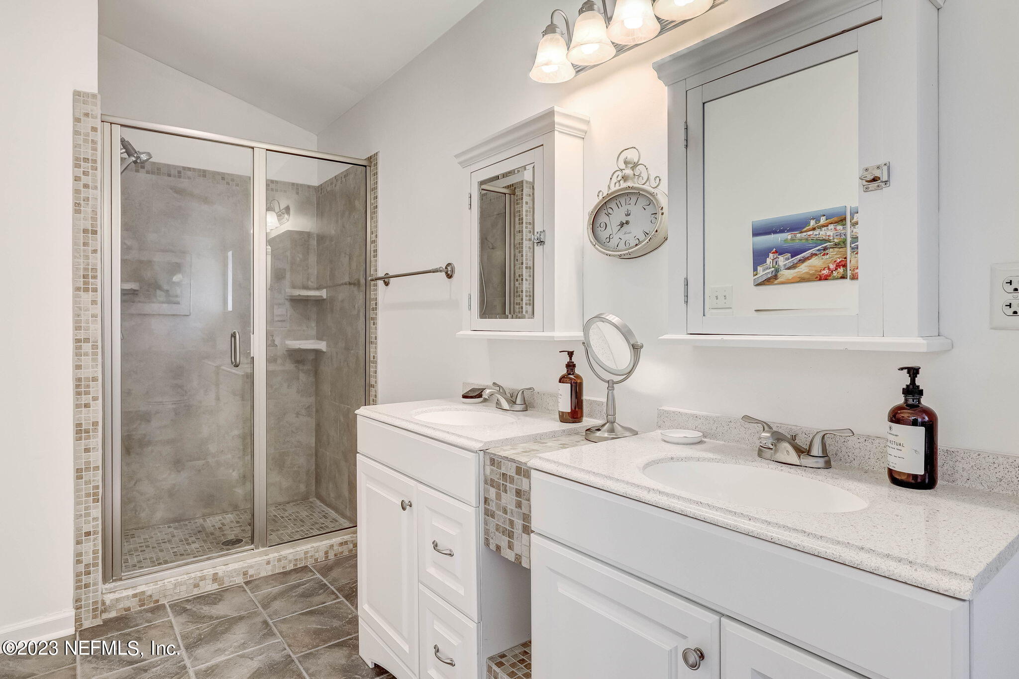1515 Mayfair Road Jacksonville, FL 32207 - Photo 37 of 52 a bathroom with a sink vanity granite and a shower