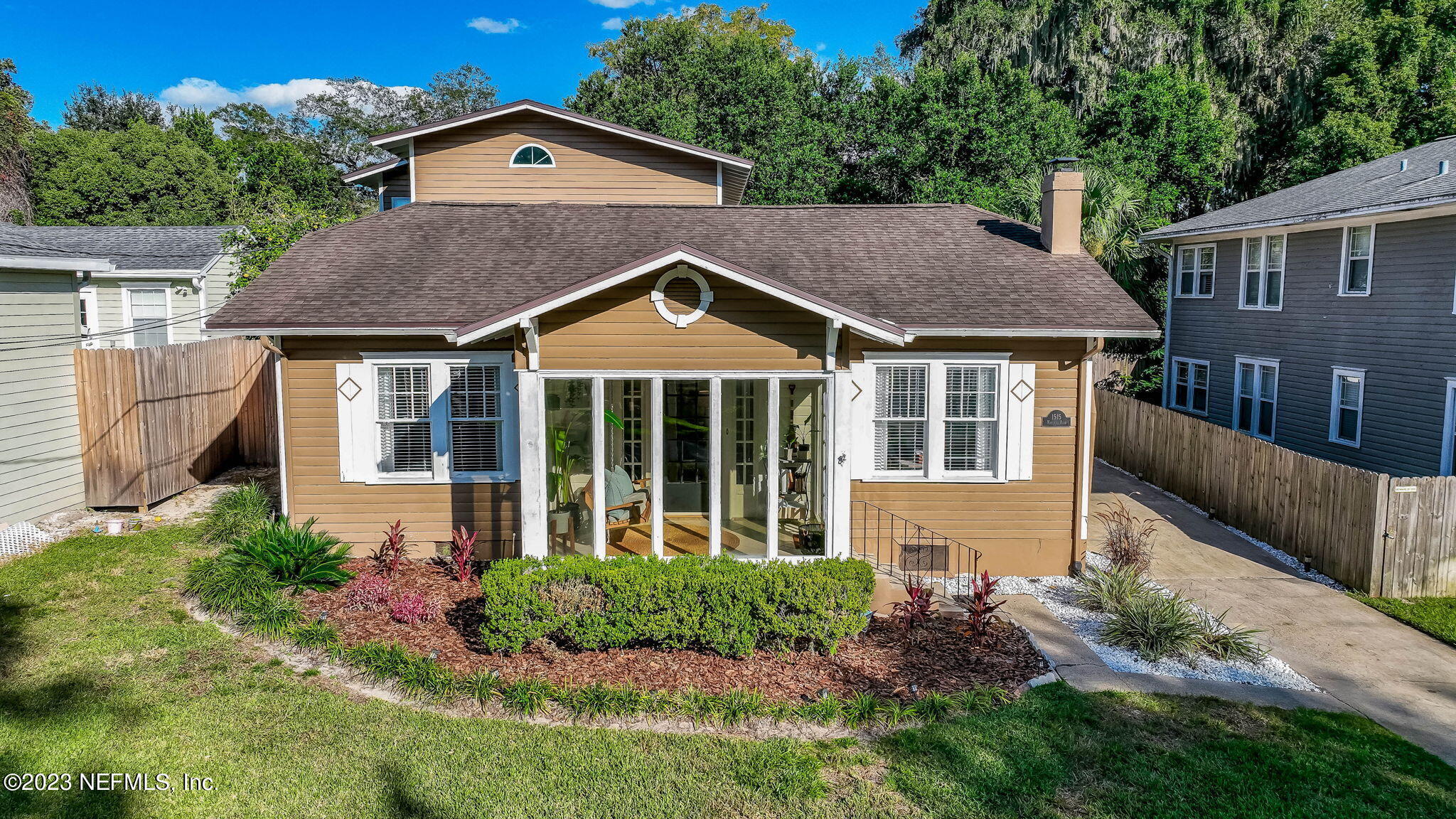 1515 Mayfair Road Jacksonville, FL 32207 - Photo 44 of 52 a front view of a house with garden