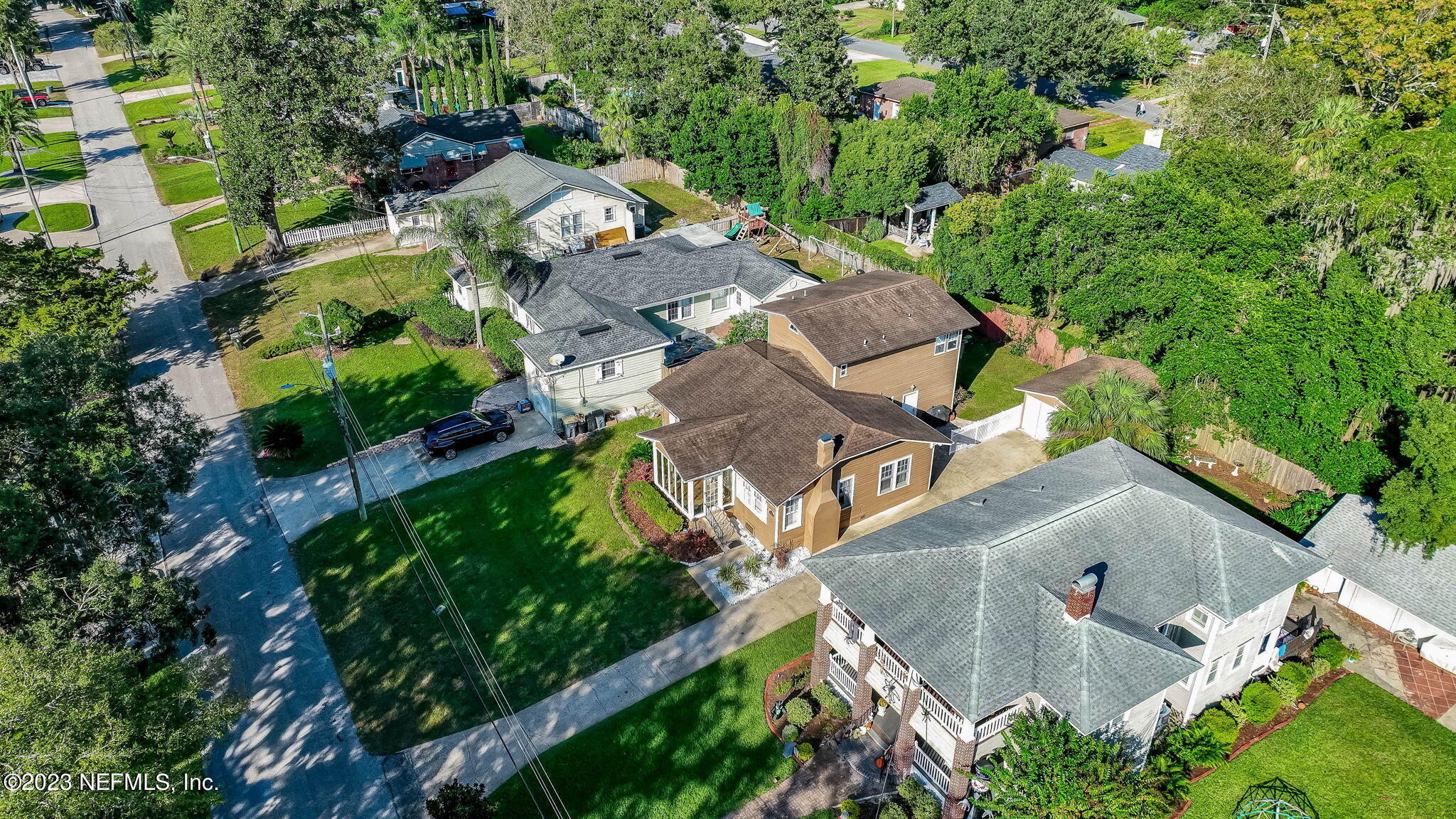 1515 Mayfair Road Jacksonville, FL 32207 - Photo 47 of 52 an aerial view of a house with a yard and trees