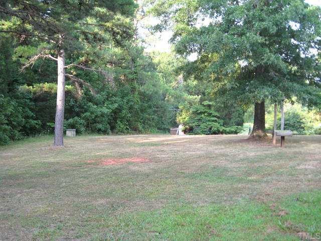 560 Pixley Pritchard Road Timberlake, NC 27583 - Photo 12 of 12 a view of outdoor space with trees