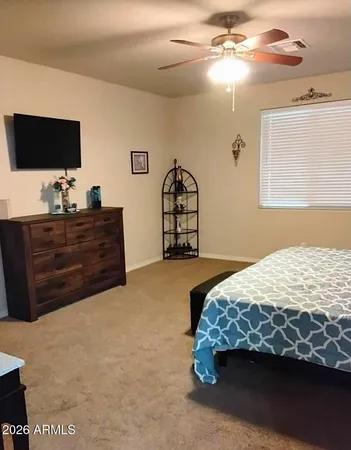 a view of a workspace with furniture