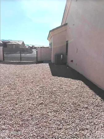 a view of backyard of house