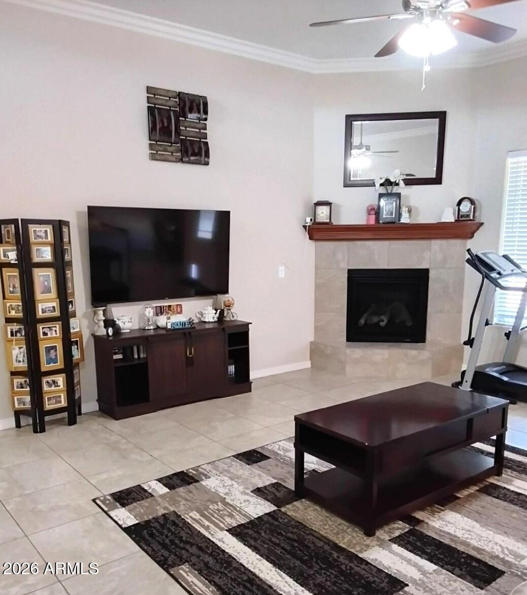 4143 North Stampede Road Kingman, AZ 86401 - Photo 4 of 28 a living room with furniture and a flat screen tv