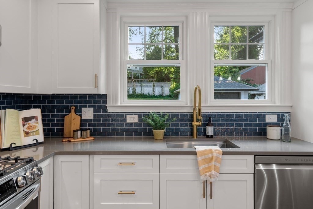 4 Clement Avenue Boston, MA 02132 - Photo 11 of 39 a kitchen with a sink and a window