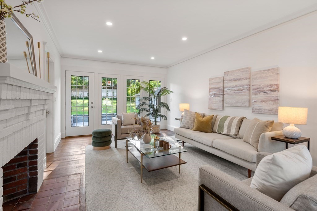 4 Clement Avenue Boston, MA 02132 - Photo 13 of 39 a living room with furniture and a fireplace