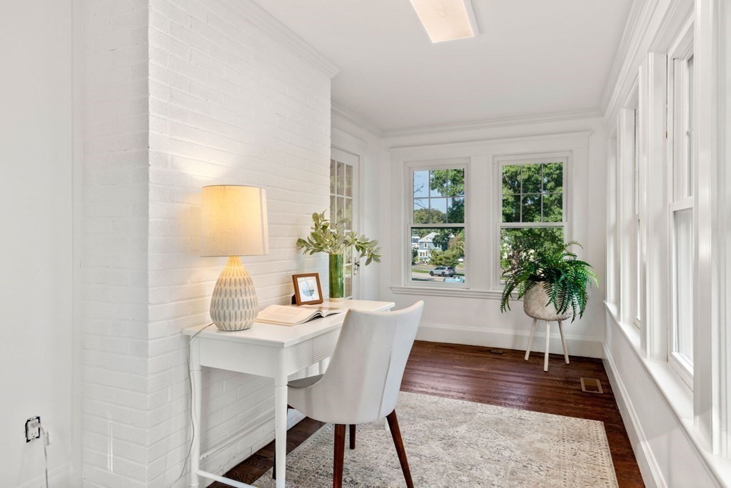 4 Clement Avenue Boston, MA 02132 - Photo 15 of 39 a dining room with furniture and wooden floor