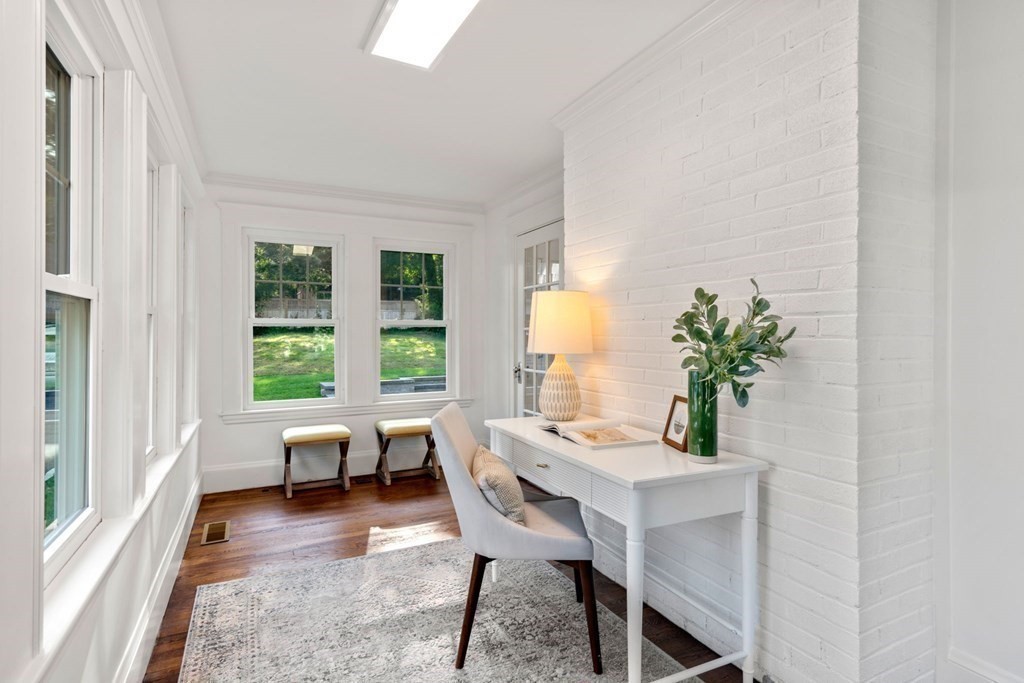 4 Clement Avenue Boston, MA 02132 - Photo 16 of 39 a view of a dining room with furniture and a potted plant