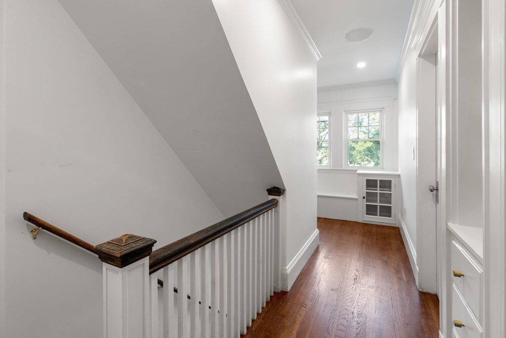 4 Clement Avenue Boston, MA 02132 - Photo 25 of 39 a view of entryway and hall with wooden floor