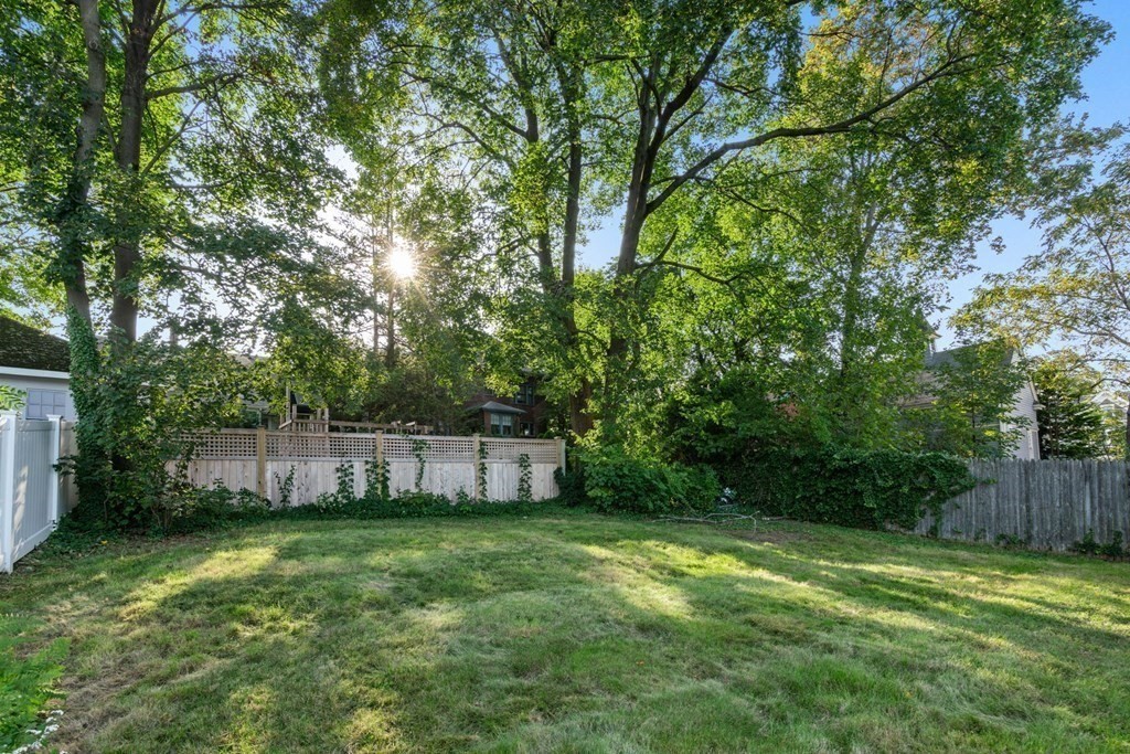 4 Clement Avenue Boston, MA 02132 - Photo 31 of 39 a view of a backyard with a garden