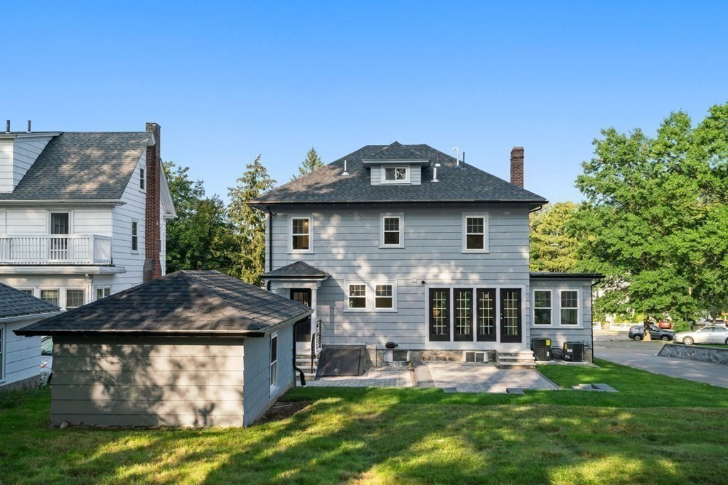 4 Clement Avenue Boston, MA 02132 - Photo 34 of 39 a front view of a house with garden