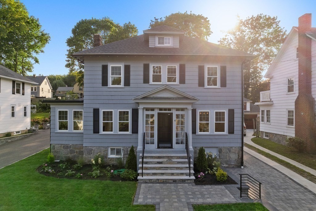 4 Clement Avenue Boston, MA 02132 - Photo 37 of 39 a front view of a house with garden