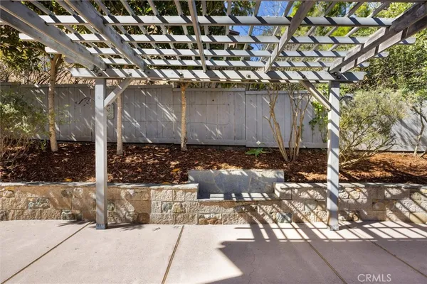 a view of a bench in a yard
