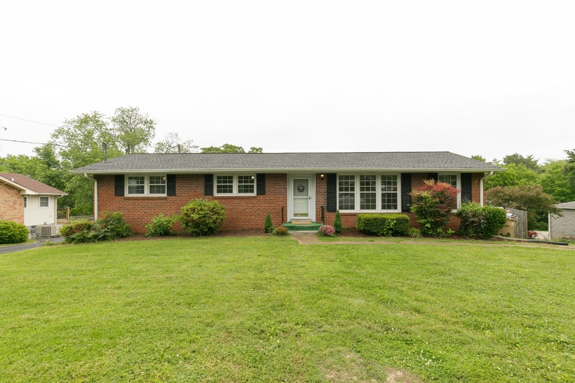 706 Ronnie Road Madison, TN 37115 - Photo 13 of 39 a front view of house with yard and green space
