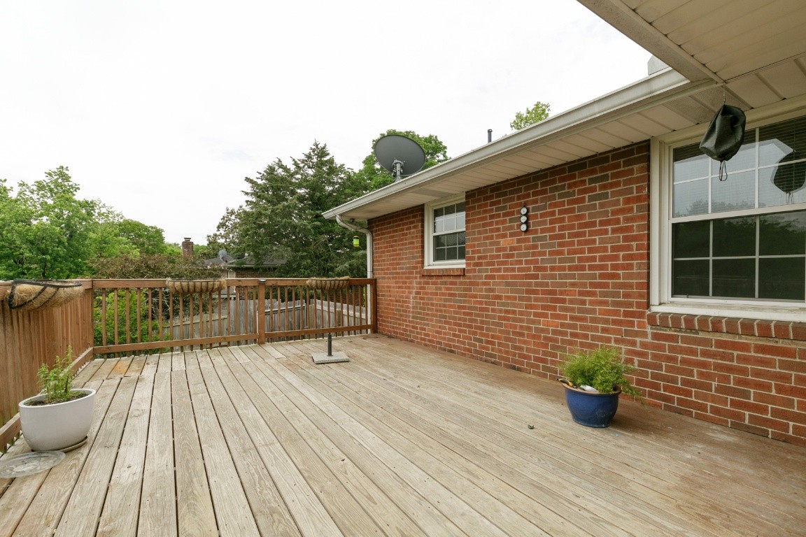 706 Ronnie Road Madison, TN 37115 - Photo 35 of 39 a view of a deck with wooden floor and fence