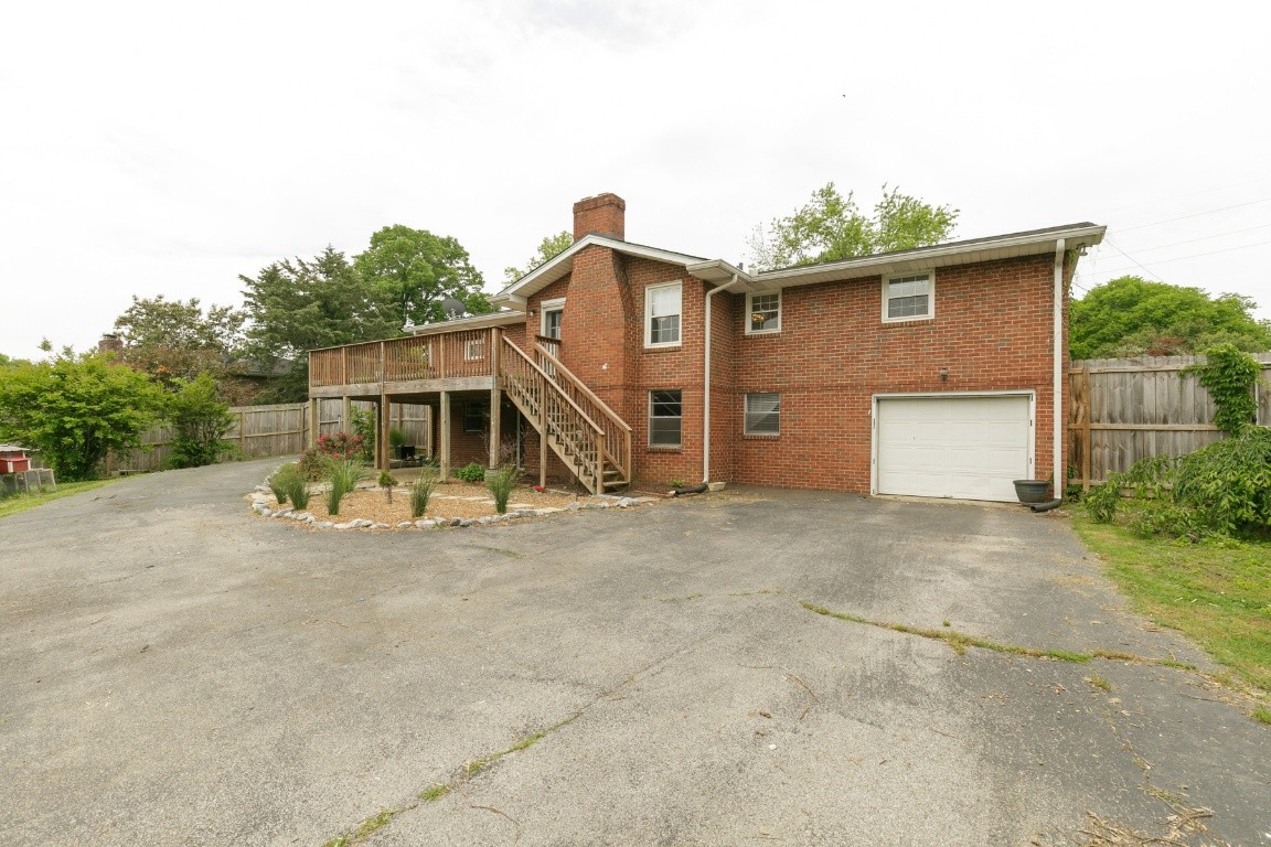 706 Ronnie Road Madison, TN 37115 - Photo 38 of 39 a view of a house with a yard and garage