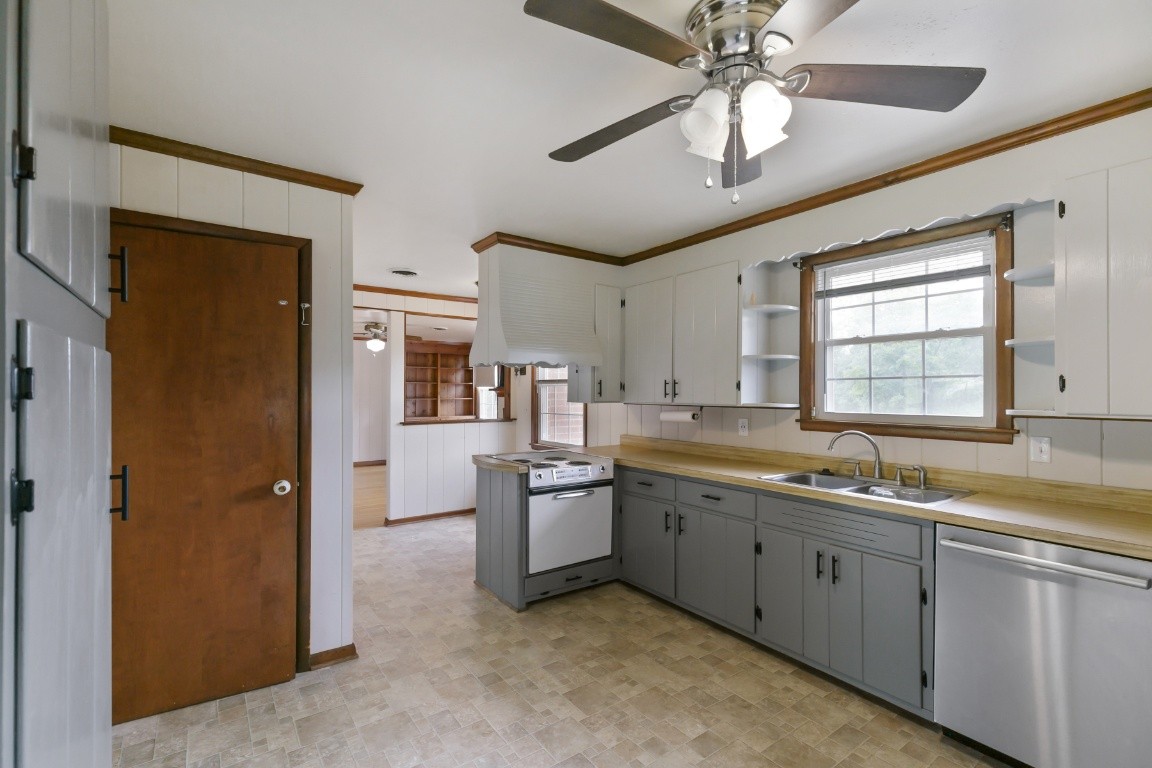 706 Ronnie Road Madison, TN 37115 - Photo 8 of 39 a kitchen with a sink stove and refrigerator