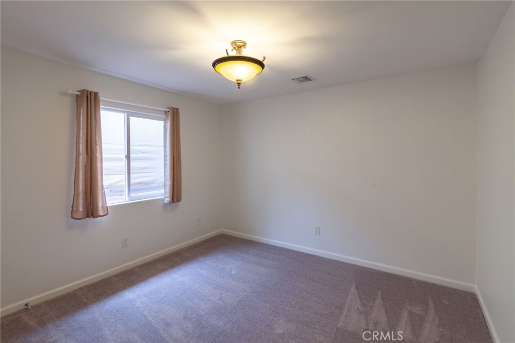 10424 Big Tujunga Canyon Road Tujunga, CA 91042 - Photo 23 of 57 an empty room with a window