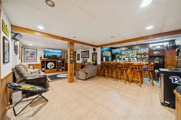 a kitchen with stainless steel appliances granite countertop a sink and cabinets