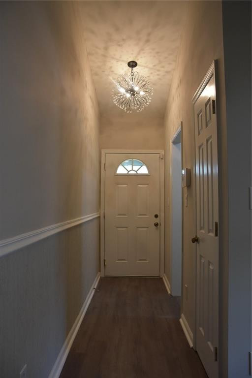 4466 Roller Court Raleigh, NC 27604 - Photo 3 of 12 a view of a hallway with chandelier fan