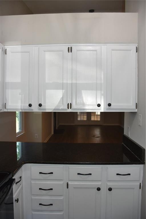 4466 Roller Court Raleigh, NC 27604 - Photo 5 of 12 a kitchen with a sink and cabinets